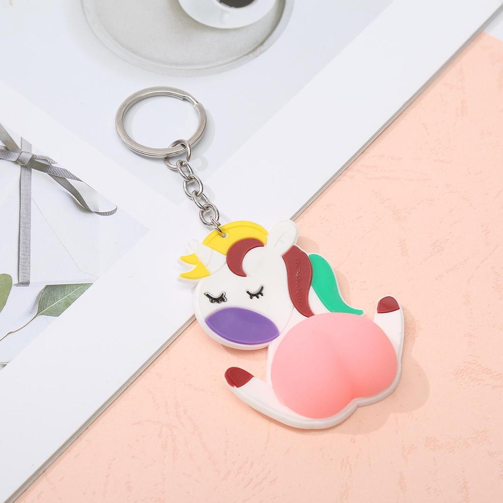 Cartoon Bouncy Butt Keychain - Soft Rubber Squeeze Pendant for Bags & Cars