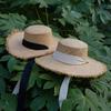 Hand-woven Raffia Hat Women's Summer Eaves Vacation Wind Flat Top Sun Hat Seaside Beach Burr Straw Hat