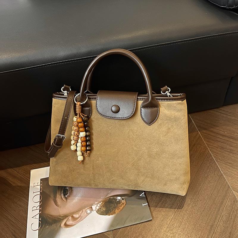 

Premium sense large-capacity bag women s bag new niche commuter texture oblique span bag chain dumpling bag