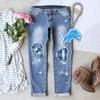 Stylish New Winter Printed Ripped Mid-Waist Women's Denim Jeans