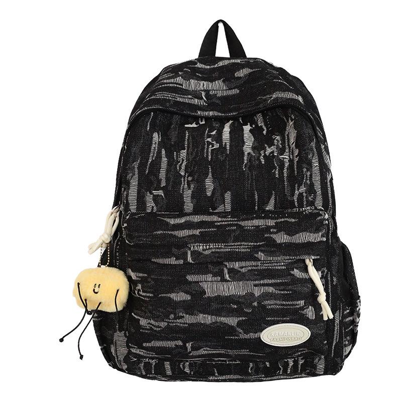 

Рюкзак большой вместимости для студентов Модный и простой джинсовый школьный рюкзак Крутой и трендовый Универсальный и повседневный рюкзак для женщин .