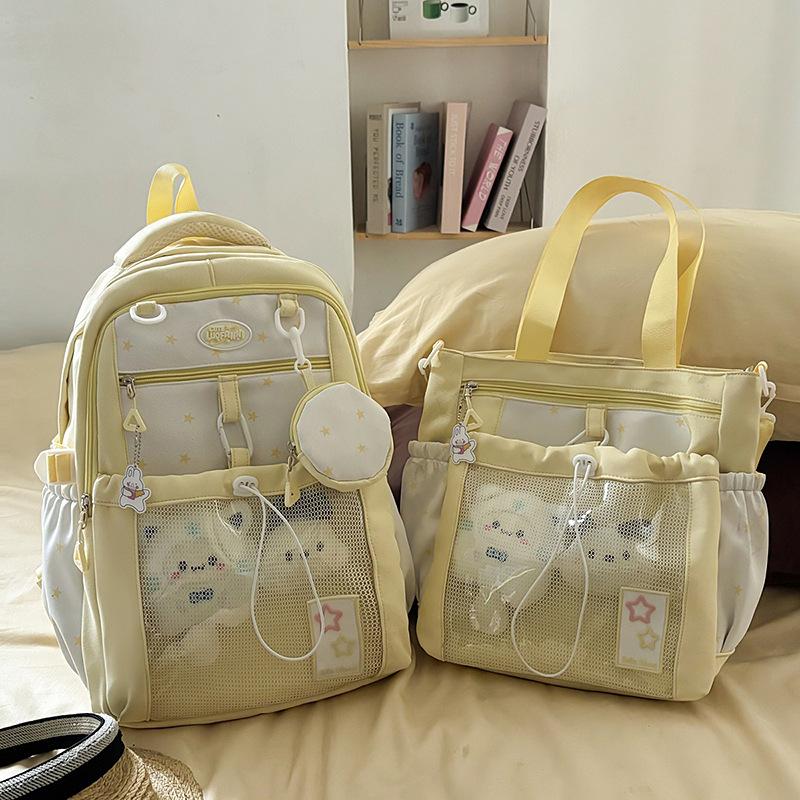 Schoolbag Korean version of the star large-capacity backpack high value junior high school college student schoolbag cute girl transparent pain bag