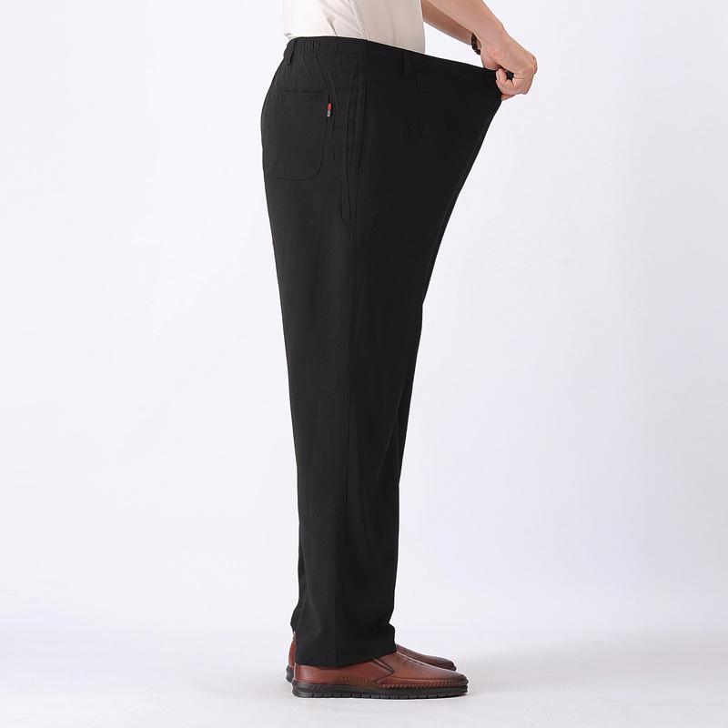 Nové letní pánské kalhoty tenkého dílu, volné prodyšné pánské kalhoty s vysokým pasem