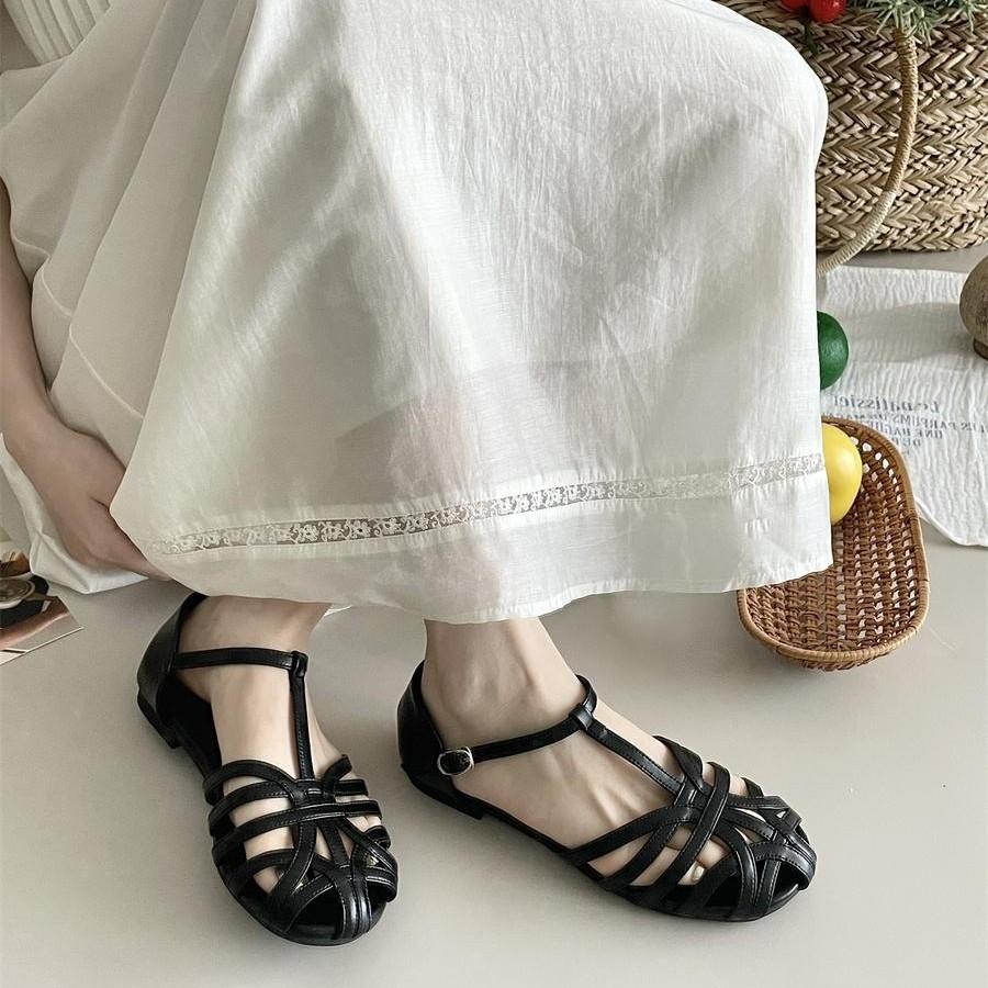 Feenwind flachbodige Schweinekäfig-Sandalen Damen 2025 Sommer neu hohl ein Riemen römisch flachbodig Tasche Kopf Sandalen Damen