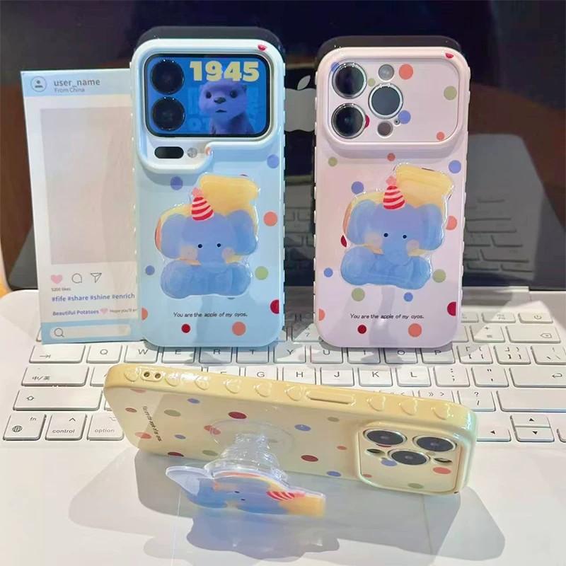 Anwendbar auf iPhone17ProMax neue Cartoon-Handyhülle, farbiger Punkt-Baby-Elefant-Halter, Apple 16 weiche Hülle 14.