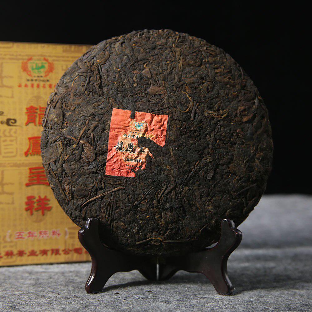 TuLin Phoenix Tea Shu Puer Ripe Puerh 2012 pětiletý materiál 357g