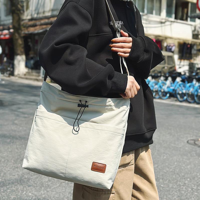 Crossbody bag men's ins trendy Japanese simple large capacity men's backpack couple shoulder bag women's casual student shoulderbag