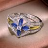 High Quality Blue Crystal Horse Eye Zircon Cross Flower Women Ring European and American Gold-plated Two-tone Ring Jewelry Gift