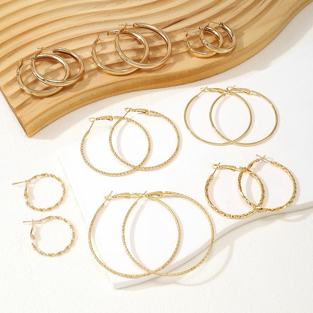 Hot-selling gold ear buckles, stacked wearing large round earrings, beating pattern twist popular popular circle earrings 1-piece set