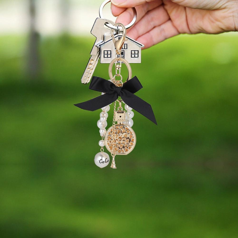 

Брелок для ключей из сплава в форме банта в виде флакона духов с жемчужиной, ручная работа, брелок для ключей, украшение