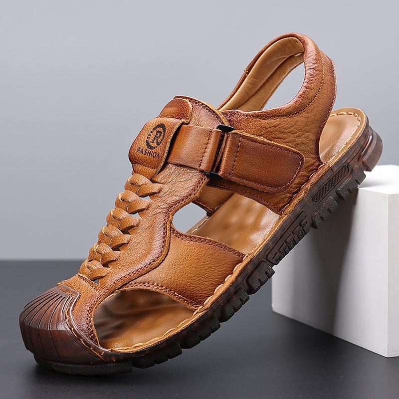 First layer cowhide sandals men's bag head summer wear casual beach shoes men's non-slip soft-soled hollow men's slippers