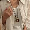 2025 New Chinese Style Unique Resin Pendant Necklace - Retro Niche Long Sweater Chain for Women