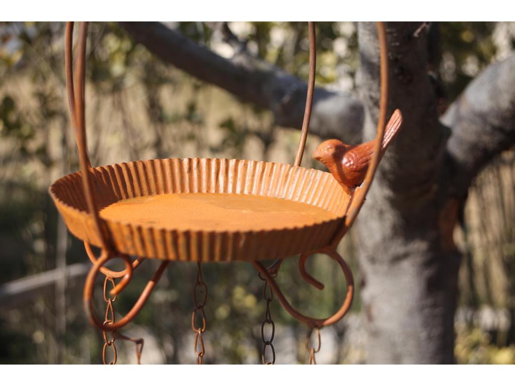 Rust-Colored Small Birdhouse Feeder with Bell Wind Chime.