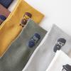 Herren-Kniebundsocken in einfarbigem Design mit hohem Bund aus Baumwolle mit Heißprägung eines Porträts – Trendiger Herbst-Winter-Stil