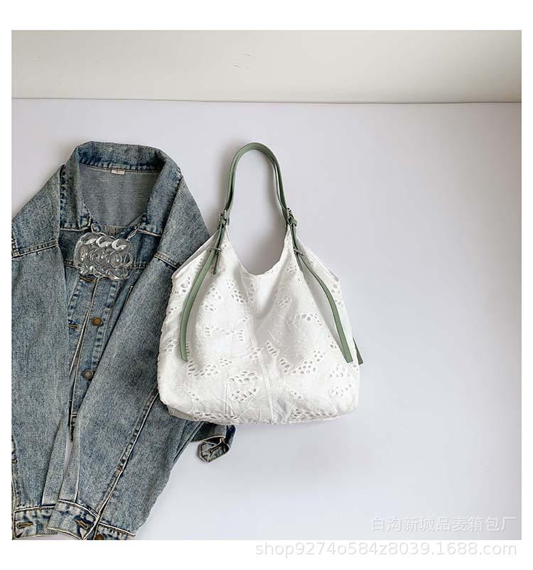 

Niche design embroidered canvas tote bag women s 2025 summer new large-capacity shopping bag resort-style shoulder bag