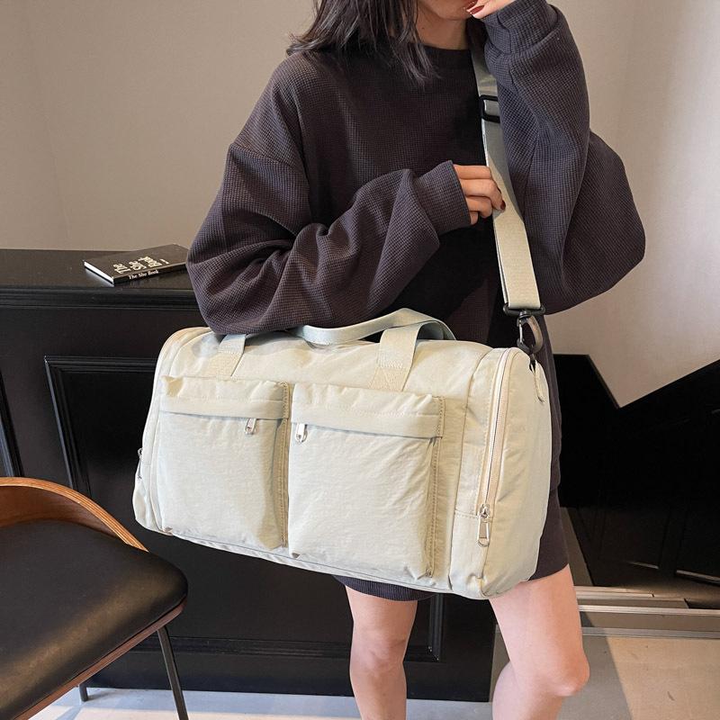 Short trip bag French designer fitness bag women's storage yoga sports bag portable light duffel bag