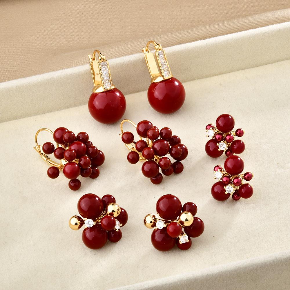 Autumn and winter new red retro pearl earrings fashion festive temperament versatile stud earrings Ankola red fireworks earrings