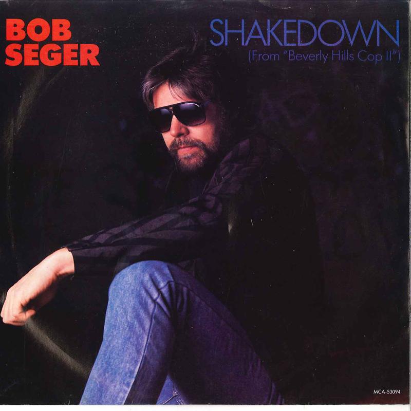 

7inch Record BOB SEGER / BOB SEGER & SILVER BULL - Shakedown / The Aftermath MCA53094A MCA 1987 Canada Rock Used