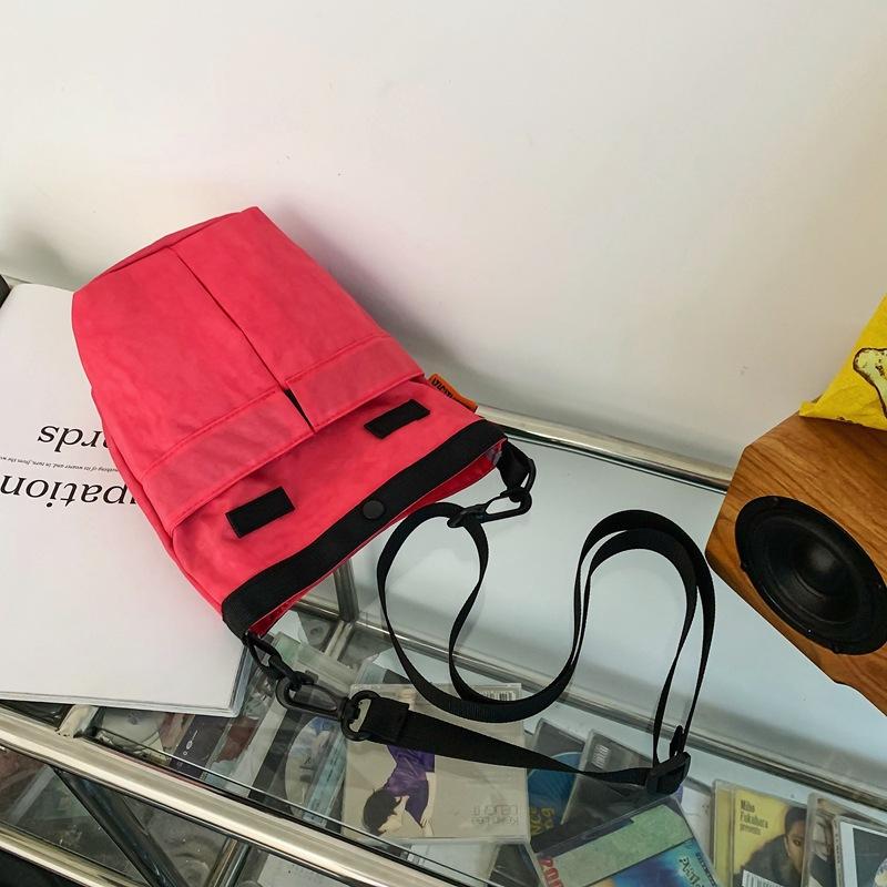 

American retro bucket bag washed cloth crossbody bag women s personality distressed small backpack men s trendy shoulder bag кавун червоний колір