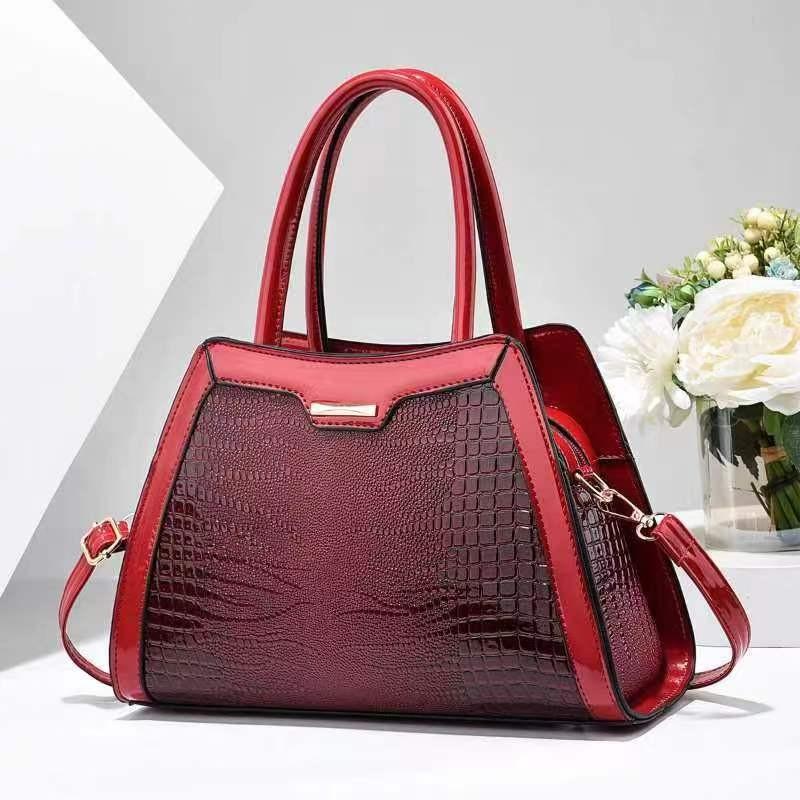 

Stylish And Trendy New Womens Bucket Bag With Chic Crocodile Pattern Design In Black Khaki And More малиновий