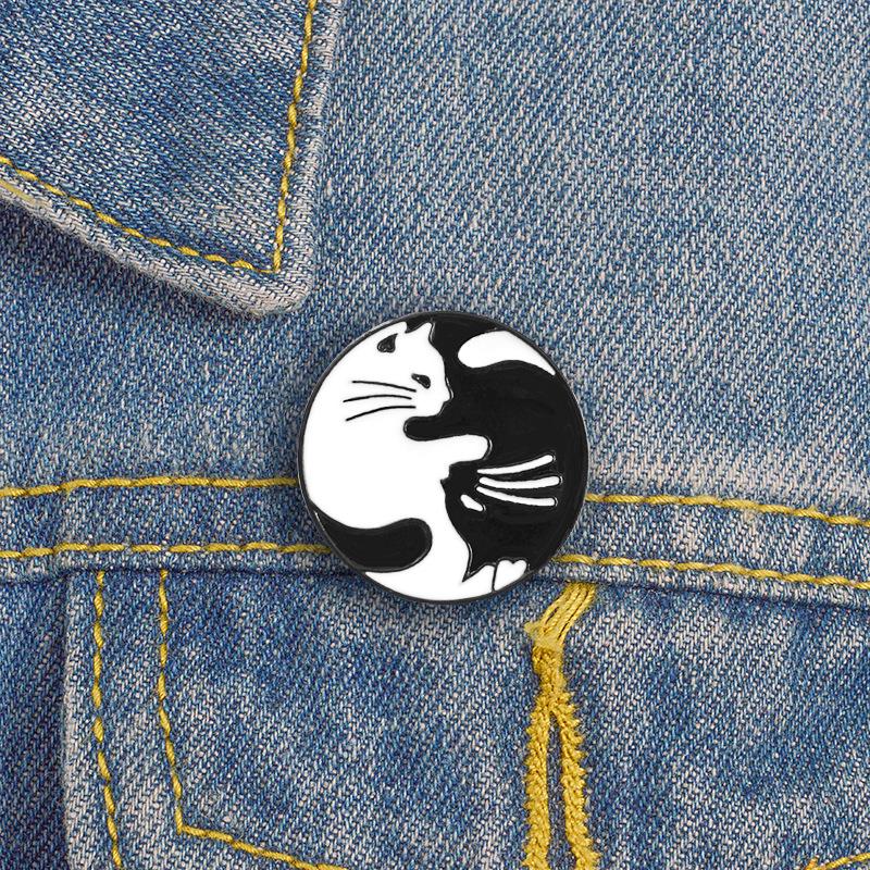 Two-Color Tai Chi Cat Hug Enamel Pin – Black and White Design