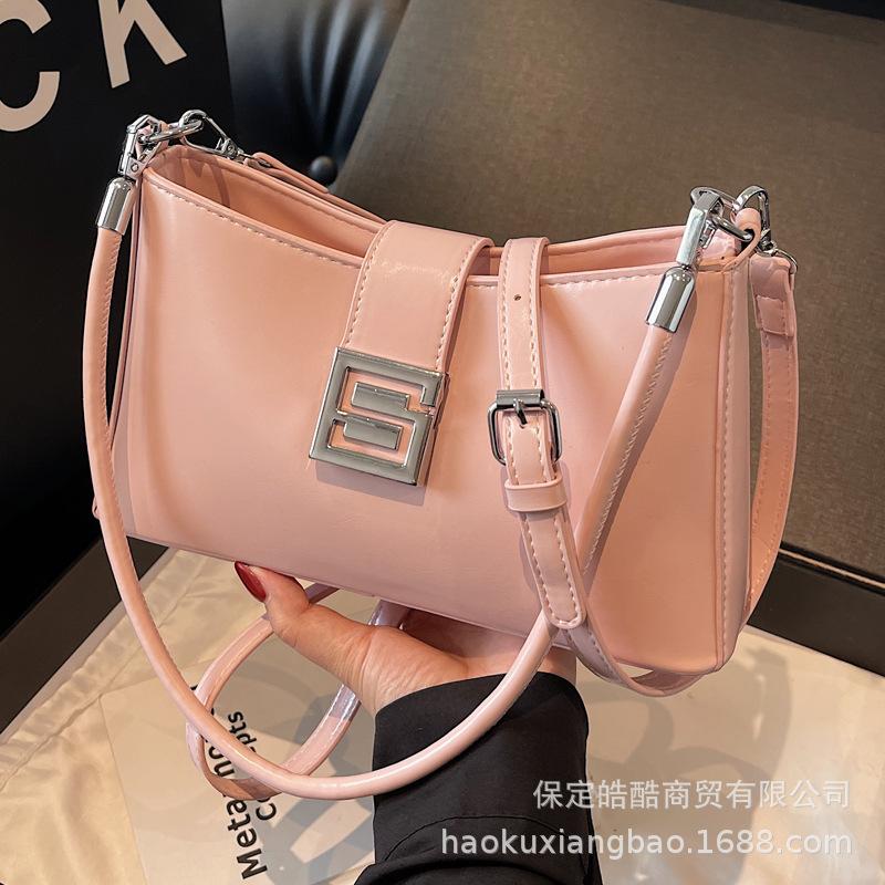 Korean version of versatile bag women's 2025 spring and summer retro fashion baguette bag niche high-end commuter casual messenger bag