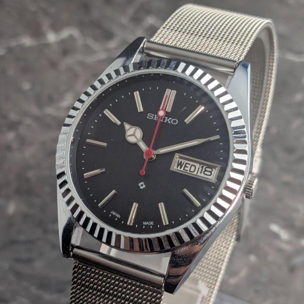 Used SEIKO Automatic Vintage Black Dial Bar Index 3-Hand Day-Date See-Through Case Back Men's Watch