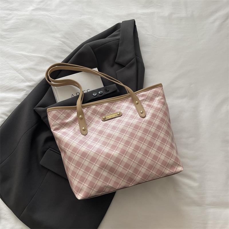 

Large capacity tote bag women s new simple temperament commuter handbag versatile fashion shoulder armpit bag