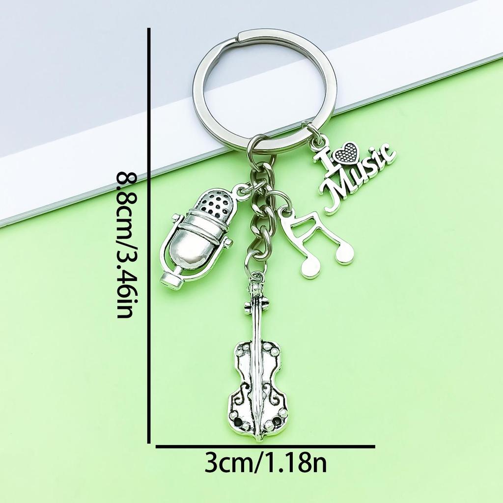 Antique Silver Music Cassette & Saxophone Keychain with Creative Design