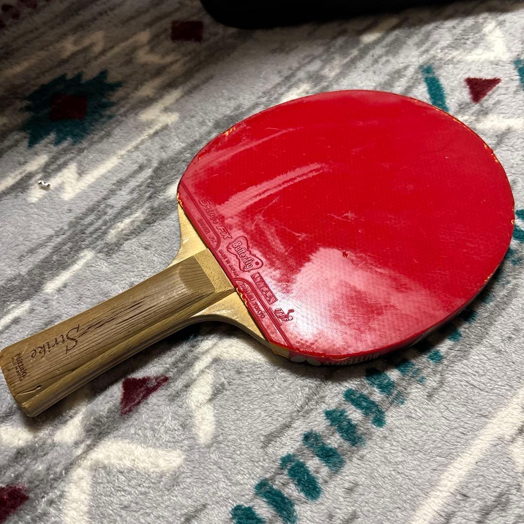 Used Nittaku Strike table tennis racket with rubber