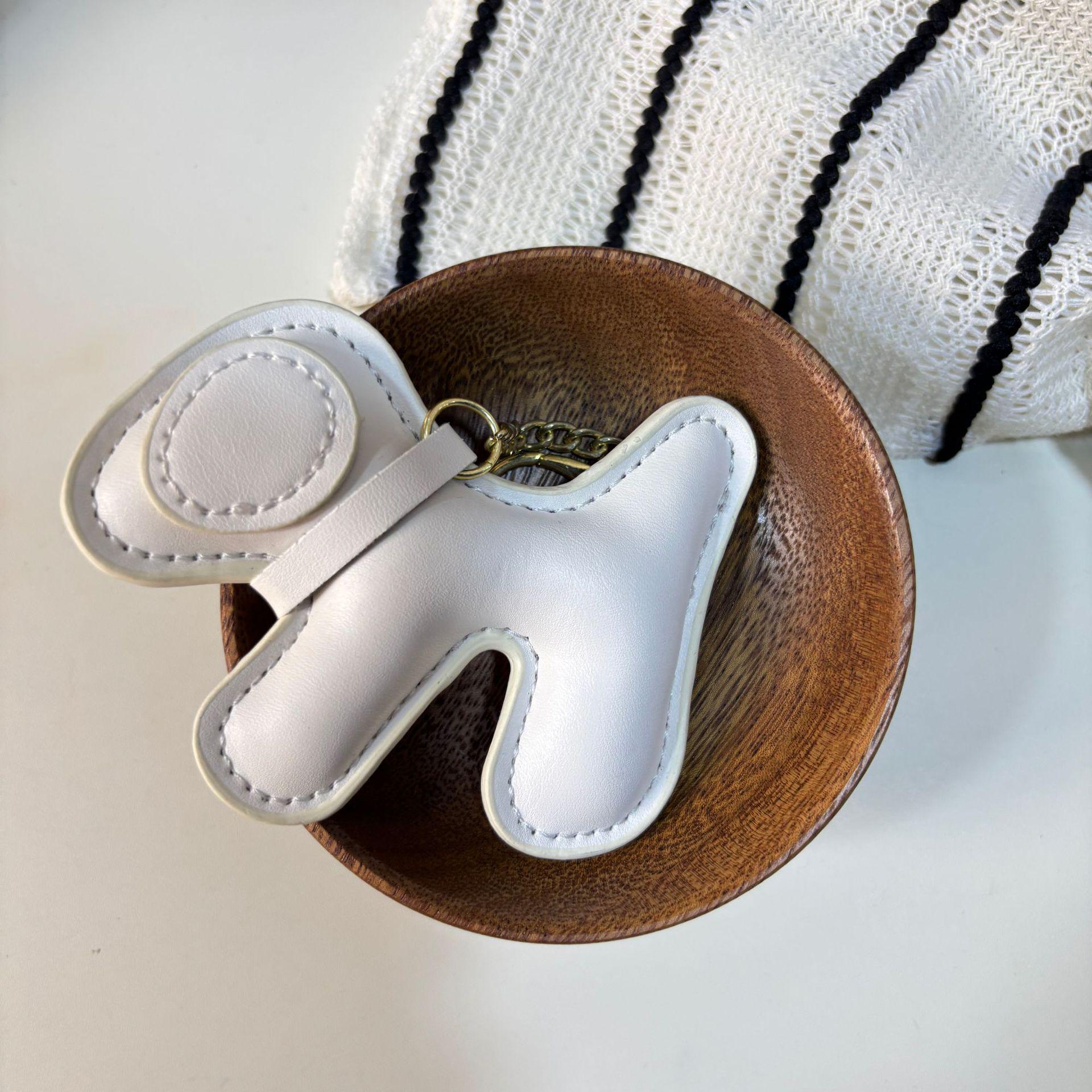 European Style PU Leather Puppy Pendant Keychain – Fashionable, Creative, and Cute High-End Accessory.