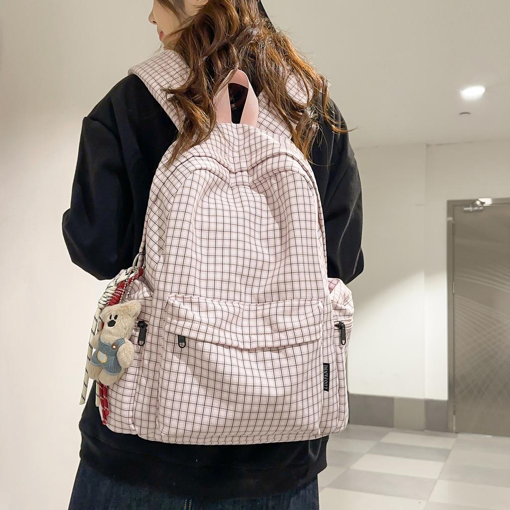 Schultasche Retro Hongkong-Stil karierter Rucksack Damen 1011 neu große Kapazität Mittelschule College-Student Schultasche Reise-Computerrucksack
