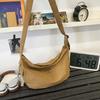 Crossbody bag for men's travel, lightweight leisure dumpling bag, simple and versatile waterproof outdoor commuting shoulder bag