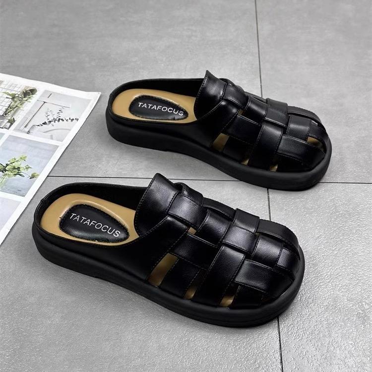 Leather bag head half slippers women's summer wear 2025 new retro woven hollow thick bottom one pedal Lazy Muller