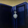 Heart-Shaped 1 Carat Moissanite Pendant Necklace with Certificate and Side Stones, D Color.