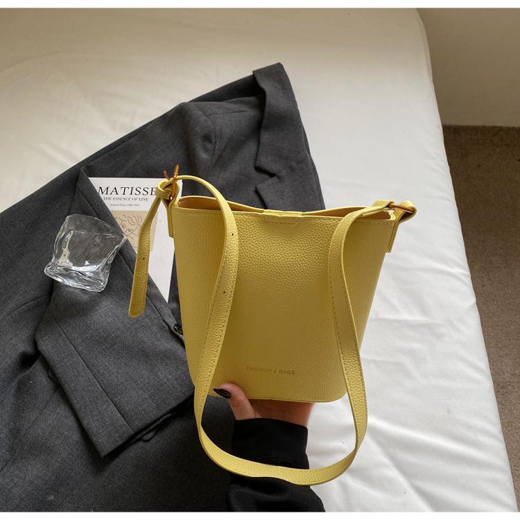 

Wholesale niche retro simple wind lychee pattern bucket bag fashionable versatile texture casual messenger child and mother bag