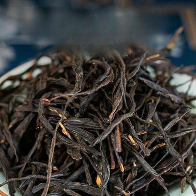 Fenghuang Qing Work Dian Hong Tee China Roter Lijiao Yunnan Uralter Baum Schwarzer Tee