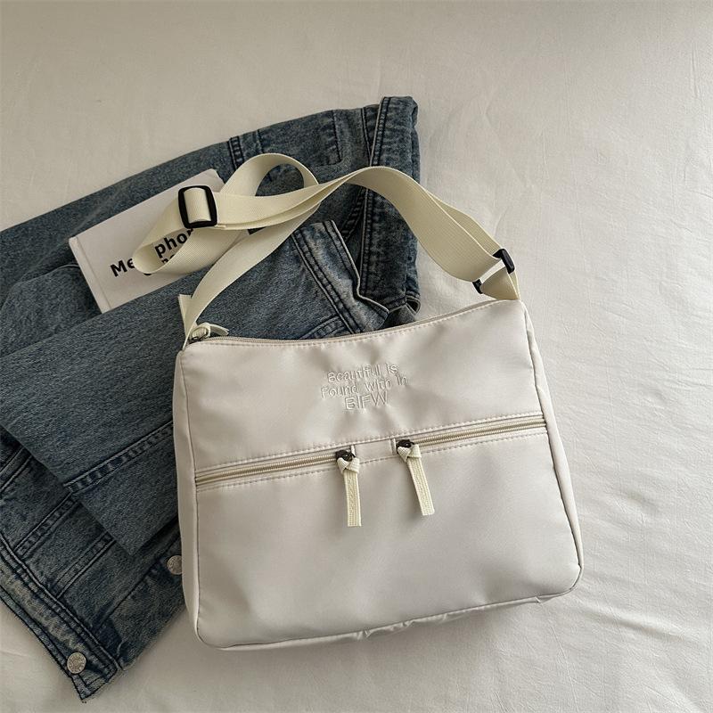 2025 spring new casual light cloth bag Japanese style solid color simple letter shoulder bag crossbody high value