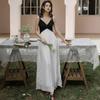 French Niche Retro Black and White Splicing Irregular Ruffle Edge Super Fairy Suspender Dress Women's Vacation Pleated Long Dress