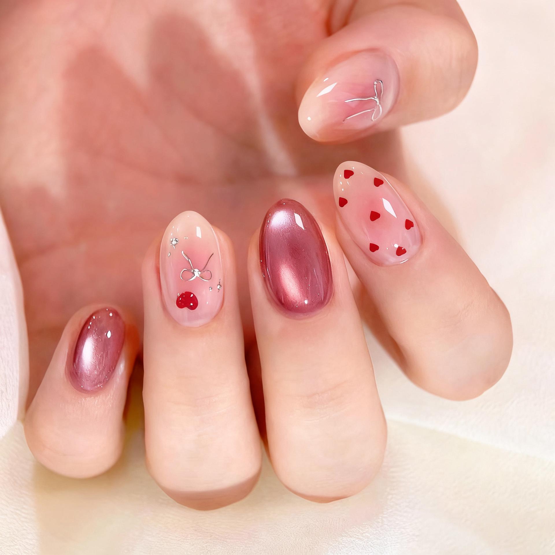 

Valentine s Cat Eye Almond Nails with Gold Foil Bow & Heart Art Finished Strip (3 Pair Full Rhinestones)