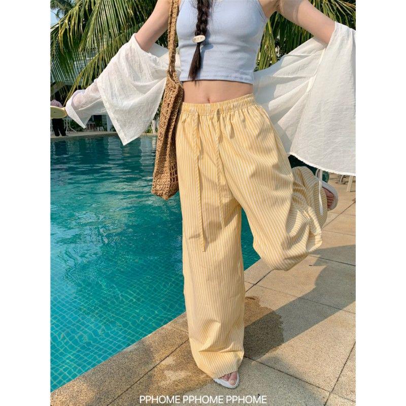 Kalhoty s vysokým pasem a širokými nohavicemi v korejském stylu s vertikálním pruhem pro ženy - Kolekce jaro/podzim 2025