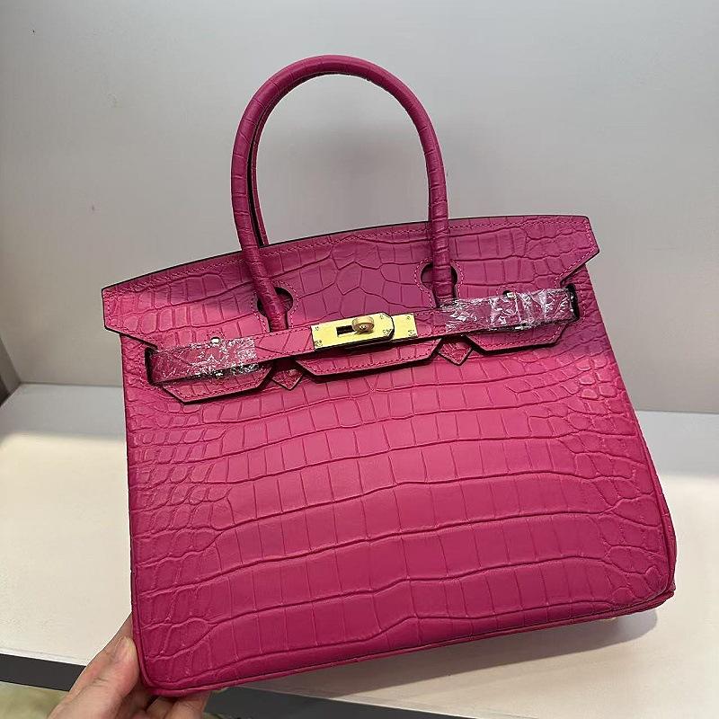 Pelle bovina primo strato motivo alligatore opaca portatile a spalla a tracolla borsa da donna premium transfrontaliera