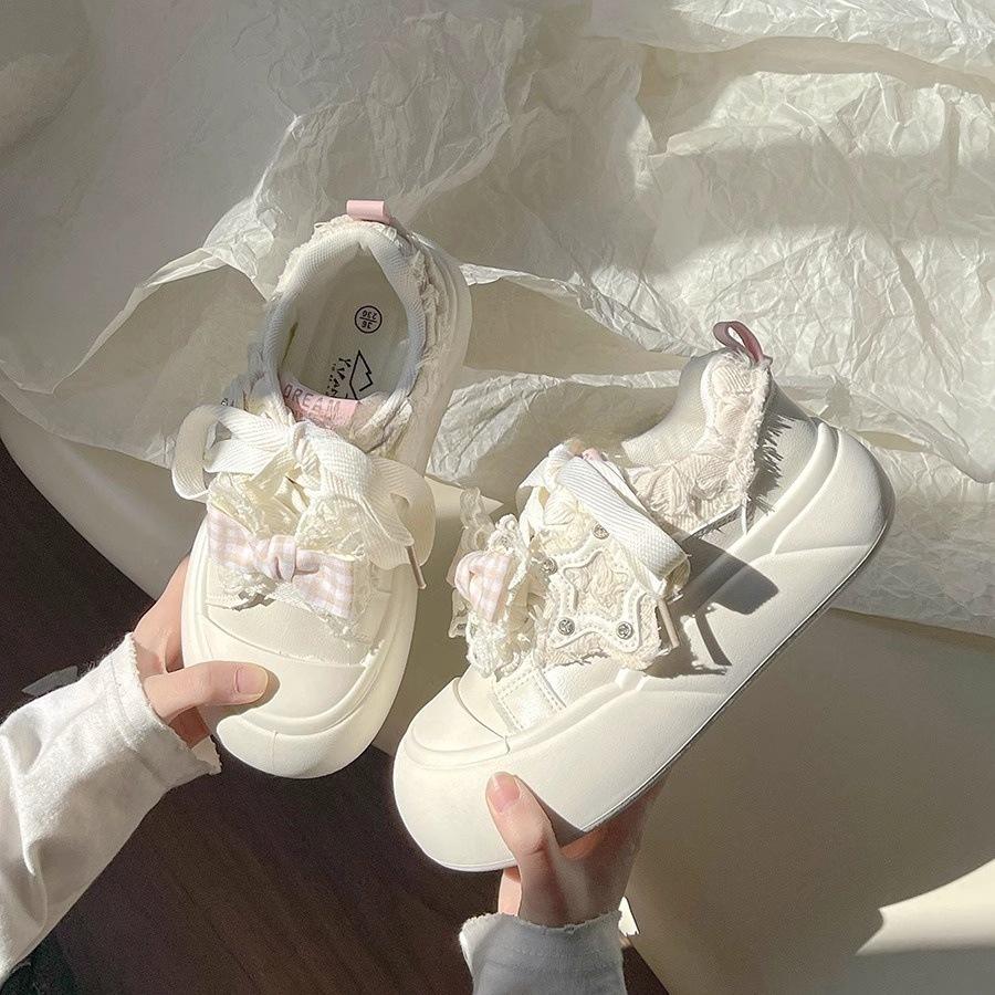 

Thick baseplate shoes women s 2025 new bread shoes spring and autumn white shoes niche versatile non-collision canvas shoes 40