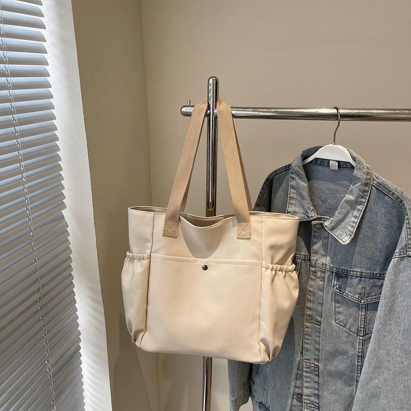 Simple canvas bag Women's tote bag Large capacity commuting Simple leisure College student work Shoulder bag Underarm bag