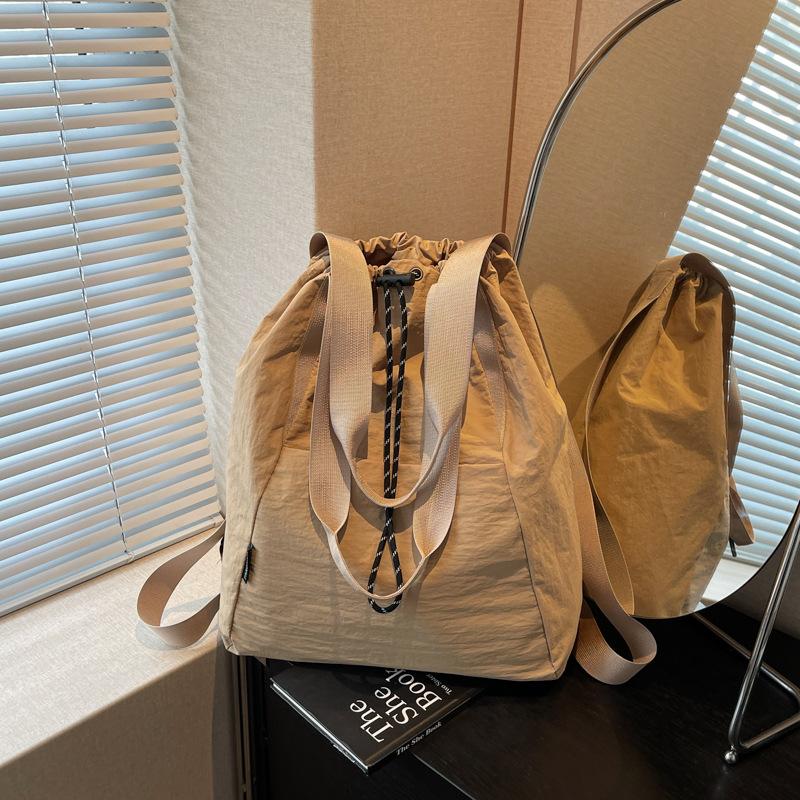 Casual lightweight drawstring multi-purpose backpack new large-capacity sports shoulder slack bucket bag