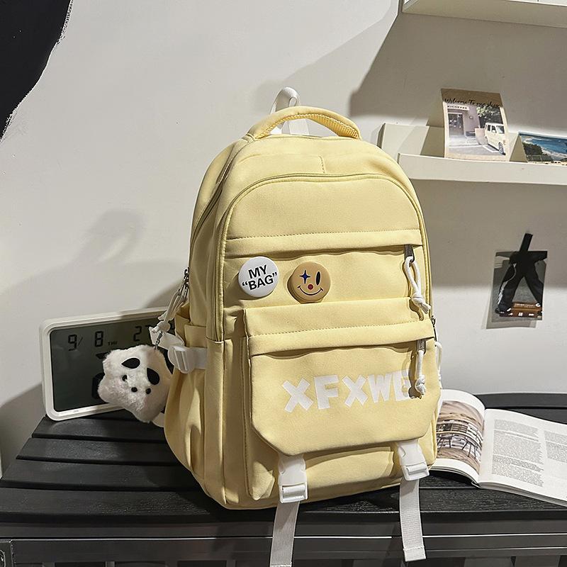 Korean ins style high appearance Harajuku trendy couple backpack junior high and high school students light and large capacity schoolbag girl