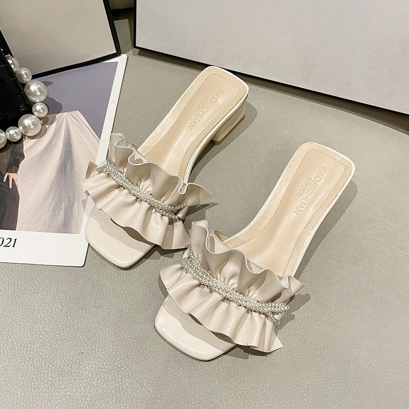 

In the summer of 2025, the new ruffle leaf edge thick heel slippers women s outer wear medium heel open toe one-word fashion sandals 39