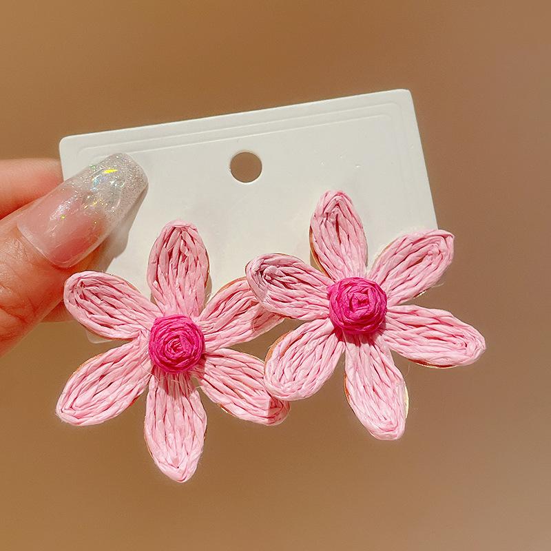 

Bohemian steel needle flower woven stud earrings niche temperament vacation style earrings literary small fresh earrings