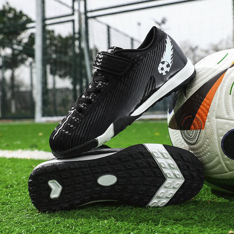2025 new children's football shoes boys and students girls broken nails Velcro casual game sports shoes