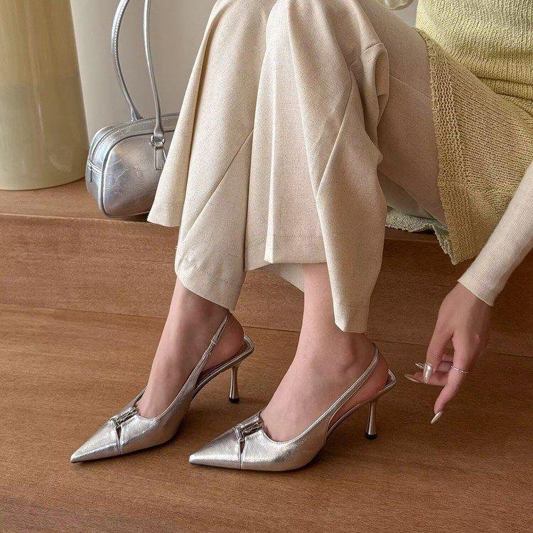 Summer 2025 new niche high-end black bag head sandals rear empty shallow mouth thin heel temperament single shoes women's shoes